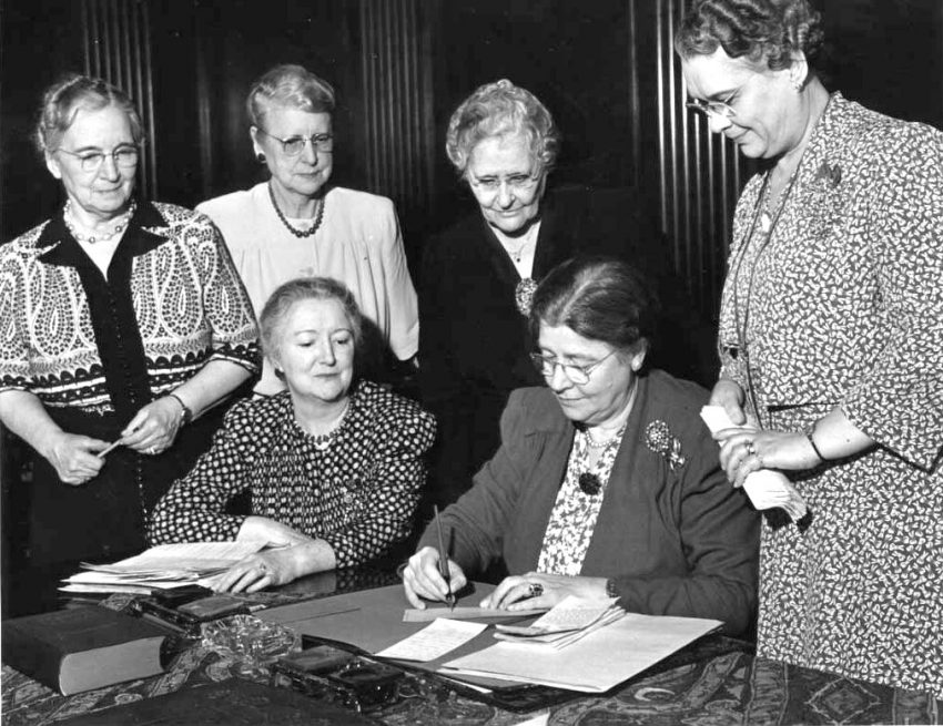 Royal Neighbors Founders signing a check